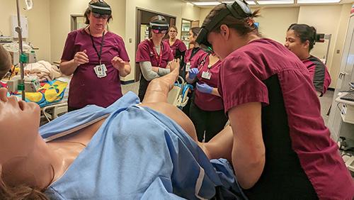 Students with birthing SIM